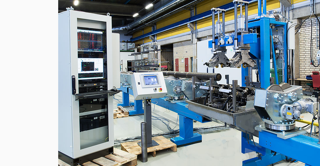 Magnetic Analysis Corp.'s APC Ultrasonic Test System for Full Body Spinning Tube Inspection with powered roller head shown in lower right
